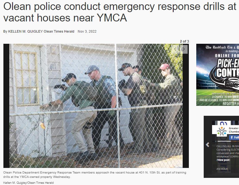 Police training outside a house